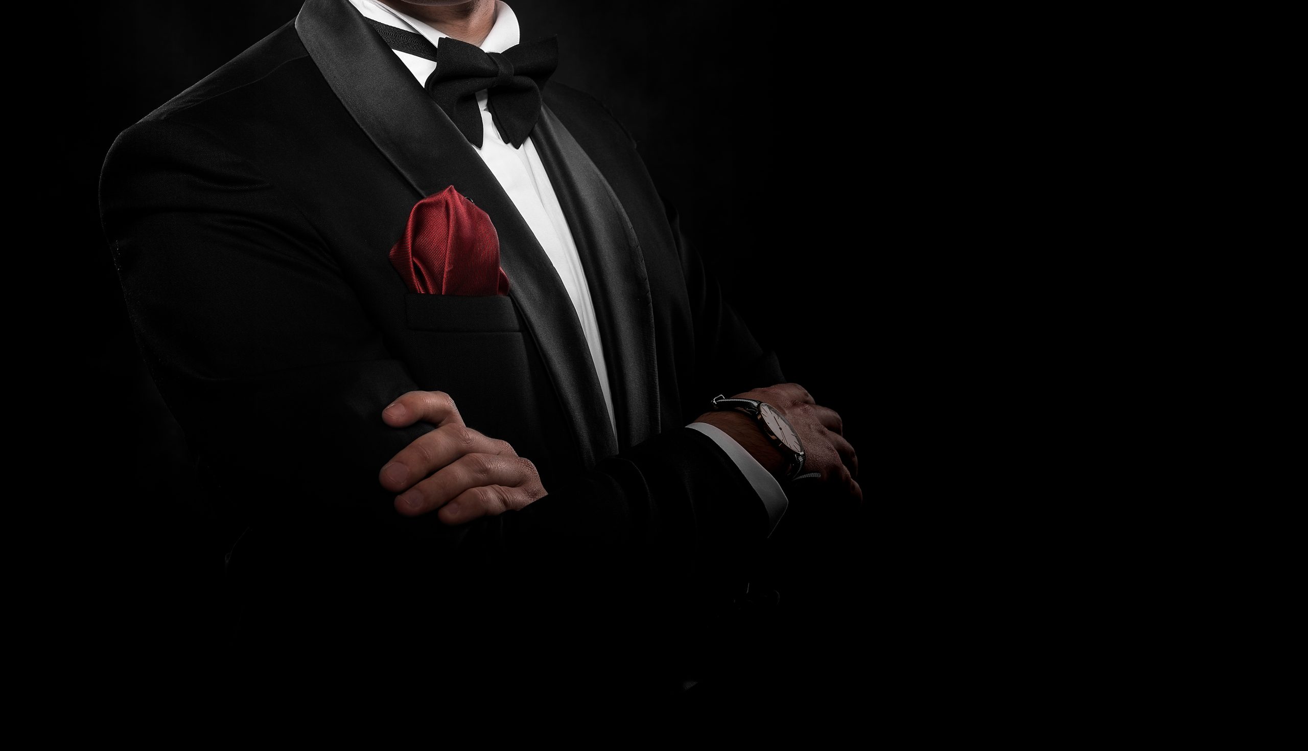 young handsome man in black suit.